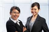 Two Asian businesswoman in office