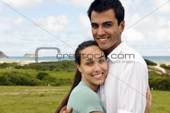 happy hispanic couple smiling