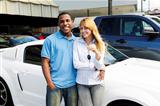 multiethnic couple buying a new car