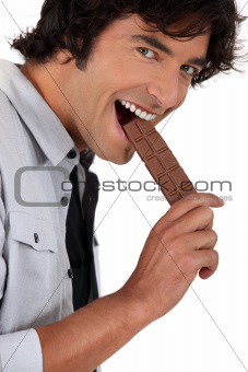 Man eating chocolate