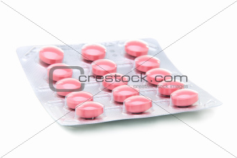 Large pink pills in the package.