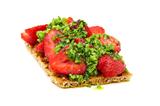 Strawberry on toast with a sauce of almonds, parsley and Parmesa