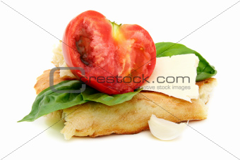 Pita bread, tomato, cheese and basil.
