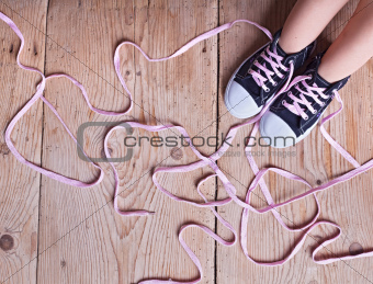 The problem - childs feet and long twisted shoelaces