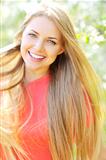 Portrait of happy cheerful smiling young beautiful blond woman, 