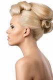 beautiful blonde woman with hair style turned in profile