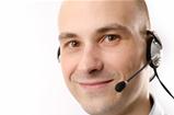 Closeup of smiling customer service agent with headset