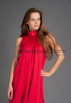 woman in red looking away