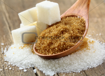 different types of sugar - brown,  white and refined sugar
