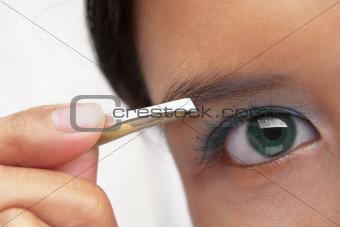 Using eyebrow tweezer