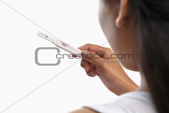 Looking at pregnancy test result