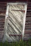 uneven old wooden door