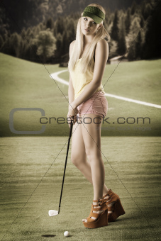 sexy golf player woman, she looks in to the lens
