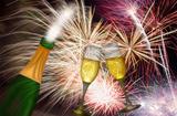 Champagne Toast with Fireworks Background