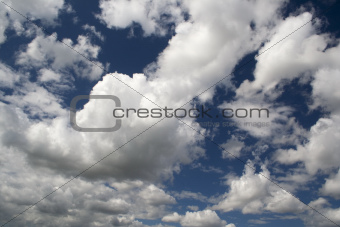 Blue sky with white and grey clouds