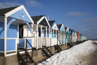 Beach Huts in the snow at Southwold, Suffolk, England