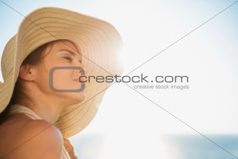 Portrait of happy woman enjoying sunshine