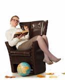 female teacher sitting in armchair