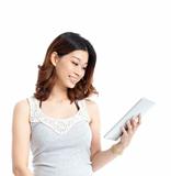 smiling asian young woman watching the tablet pc
