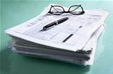 Pile of documents and tax form