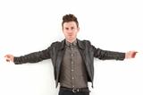 Young adult man posing with leather jacket