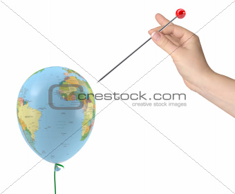 The hand with the needle aimed at the balloon with the texture of the planet earth