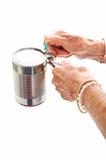 Elderly Hands Struggle with Can Opener