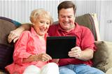 Mother and Son Using Tablet PC