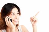 young woman talking on the phone and pointing something