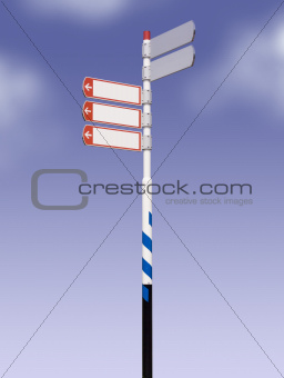 street sign against blue sky