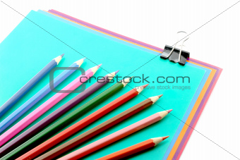 Color papers, black clip and pencils