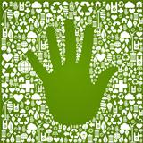 Hand with green icons background