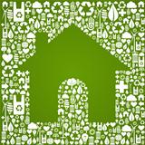 Green house over eco icons background