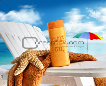 Suntan lotion on chair at the  beach