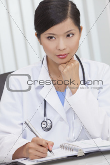 Chinese Female Woman Hospital Doctor Writing In Office