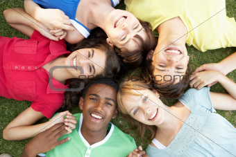Group Of Teenagers Looking Up Into Camera