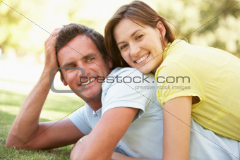 Portrait Of Romantic Couple In Park