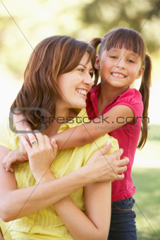 Portrait Of Mother And Daughter Together In Park