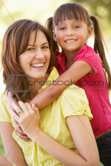 Portrait Of Mother And Daughter Together In Park