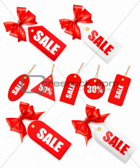 Big set of sales tags with red gift bow and ribbons illustration