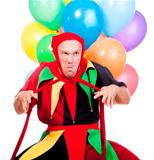 jester - entertaining figure in typical costume with colorful balloons