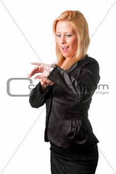 Businesswoman looking at her watch