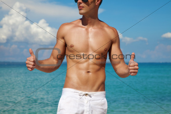 Thumbs up for a beach body
