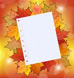 Colorful autumn maple leaves with note paper