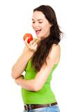 Happy young woman holding apple
