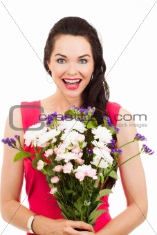 Surprised woman holding flowers