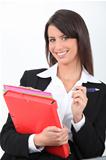 portrait of a businesswoman with file