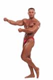  Male body builder demonstrating pose, isolated