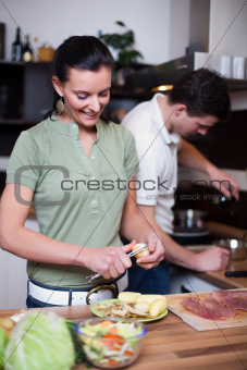 Young couple preparing lunch