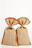 two jute bags on a white table